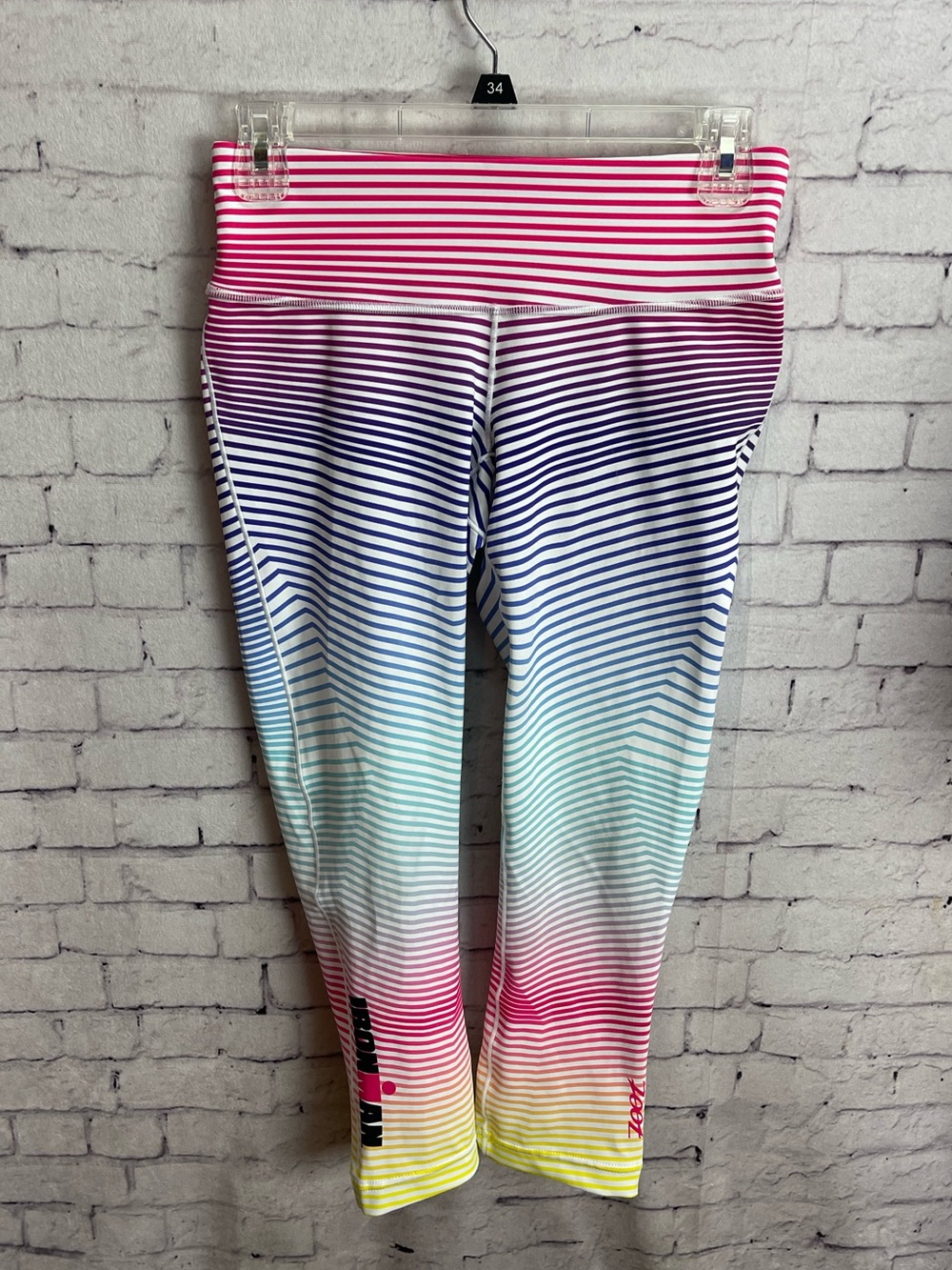 Zoot Ironman Capri leggings size small sunset gradient stripe